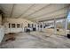 A covered patio providing ample space for outdoor entertaining and relaxation at H-5422 Hill Sw Rd, Powder Springs, GA 30127