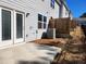 Fenced backyard with a concrete patio and minimal landscaping at 3568 Eagle Sw Ct, Atlanta, GA 30331