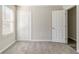 Bedroom with fresh paint and new carpet near closet at 6218 Creekford Ln, Lithonia, GA 30058