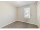 Cozy bedroom with soft carpet, natural light from the window, and a closet for storage at 6218 Creekford Ln, Lithonia, GA 30058