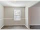 Cozy dining area with gray flooring and white trim at 6218 Creekford Ln, Lithonia, GA 30058