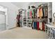 Spacious walk-in closet featuring custom shelving for optimal storage and organization at 6669 Encore Blvd, Atlanta, GA 30328