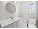 Modern bathroom boasts a stylish vanity, updated fixtures, and plenty of natural light at 772 Verde Dr, Riverdale, GA 30274