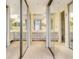 Bathroom featuring mirrored closet doors and vanity with lace at 806 Lismore Se, Smyrna, GA 30080