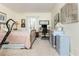 Bright bedroom featuring a gold metal bed frame, desk, and neutral walls at 806 Lismore Se, Smyrna, GA 30080