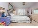 Bright bedroom with matching dressers, light walls, and light-filtering window treatments at 806 Lismore Se, Smyrna, GA 30080