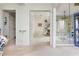 Bright breakfast nook features white wicker furniture and a decorative chandelier at 806 Lismore Se, Smyrna, GA 30080