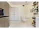 Kitchen and eating area with stainless steel refrigerator at 806 Lismore Se, Smyrna, GA 30080