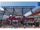 Exterior daytime view of the Atlanta Braves stadium entrance, buzzing with activity and excitement at 806 Lismore Se, Smyrna, GA 30080