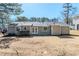 Expansive backyard with a patio and lush greenery, perfect for outdoor entertaining and relaxation at 2419 Leslie Brook Dr, Decatur, GA 30035