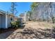 Side yard with a view of adjacent house and surrounding landscape at 2419 Leslie Brook Dr, Decatur, GA 30035