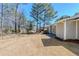 Side yard with a patio and a view of the surrounding landscape and other houses at 2419 Leslie Brook Dr, Decatur, GA 30035