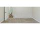Bedroom with neutral walls, carpet, and an attached bath at 2419 Leslie Brook Dr, Decatur, GA 30035