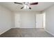 Bedroom with neutral walls and carpet featuring a ceiling fan at 2419 Leslie Brook Dr, Decatur, GA 30035