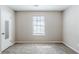 A bright bedroom features neutral carpet and walls at 2419 Leslie Brook Dr, Decatur, GA 30035