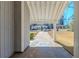 View of the carport, providing covered parking and leading to the front entrance of the house at 2419 Leslie Brook Dr, Decatur, GA 30035