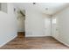 Open living room featuring vaulted ceiling, wood floors, and a bright, airy atmosphere at 2419 Leslie Brook Dr, Decatur, GA 30035