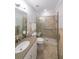 This bathroom features a glass-enclosed shower and updated fixtures at 405 Grafton Walk, Woodstock, GA 30188