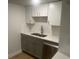 This functional kitchen features modern sink, faucet and new stainless steel dishwasher at 5611 Executive Way, Norcross, GA 30071