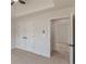 Neutral bedroom features carpet, a closet, and a doorway to another room at 2724 Kristen Ct, Conyers, GA 30012