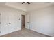 Neutral bedroom features carpet, a closet, and a doorway to another room at 2724 Kristen Ct, Conyers, GA 30012