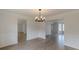 Elegant dining room with decorative chair rail and crown molding at 2724 Kristen Ct, Conyers, GA 30012