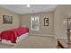 Comfortable bedroom with a twin bed, window with shutter and a bedside lamp at 203 Roseman Way, Woodstock, GA 30188