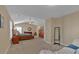 Large main bedroom suite showcasing a king bed, sitting area and walk-in closet at 203 Roseman Way, Woodstock, GA 30188