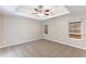 Spacious main bedroom with a modern ceiling fan and bright, natural light at 5193 Seaside Ct, Atlanta, GA 30349