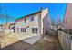 Back of home featuring double doors and concrete patio at 120 Daniel Creek Ln, Sugar Hill, GA 30518