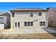 Back of home featuring double doors and concrete patio at 120 Daniel Creek Ln, Sugar Hill, GA 30518