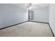 Cozy bedroom with neutral carpet, natural light, and a ceiling fan at 120 Daniel Creek Ln, Sugar Hill, GA 30518