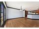 Dining room featuring hardwood floors and view of kitchen at 120 Daniel Creek Ln, Sugar Hill, GA 30518