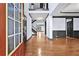 Inviting foyer with gleaming hardwood floors and a view of the staircase at 120 Daniel Creek Ln, Sugar Hill, GA 30518