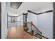 Light and airy hallway with hardwood floors and elegant staircase at 120 Daniel Creek Ln, Sugar Hill, GA 30518