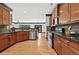 Open kitchen featuring wood cabinets, stainless steel appliances, and granite countertops at 120 Daniel Creek Ln, Sugar Hill, GA 30518