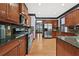 Kitchen with stainless steel appliances and granite countertops at 120 Daniel Creek Ln, Sugar Hill, GA 30518