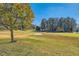 Scenic view of a well-manicured golf course featuring lush fairways and mature trees at 1801 Beecher Sw St, Atlanta, GA 30310