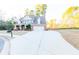 Charming two-story brick home with a spacious driveway and attached two-car garage at 2474 Starfire Ln, Loganville, GA 30052
