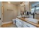 Bathroom featuring double sink vanity and walk-in shower at 504 Leguin Mill Rd, Locust Grove, GA 30248