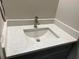 Close up of a bathroom vanity showcasing a modern faucet and quartz countertop at 6910 Stone Breeze Dr, Stone Mountain, GA 30087