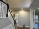 Bright entryway with high ceilings and stairway at 6910 Stone Breeze Dr, Stone Mountain, GA 30087