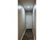 Hallway showcasing modern paint and trim leading to doorways at 6910 Stone Breeze Dr, Stone Mountain, GA 30087