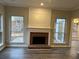 Cozy living room with fireplace and neutral decor at 6910 Stone Breeze Dr, Stone Mountain, GA 30087