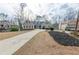 Lovely single Gathering home featuring well maintained landscaping and a long drive way at 814 Oak Moss Dr, Lawrenceville, GA 30043