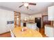 Bright kitchen with white cabinets, granite countertops, and stainless steel appliances at 814 Oak Moss Dr, Lawrenceville, GA 30043