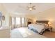 Spacious main bedroom features a trey ceiling, neutral colors, and carpeted floors at 814 Oak Moss Dr, Lawrenceville, GA 30043