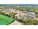 Scenic view of a modern mid-rise building in a tree-filled neighborhood at 112 Rogers Ne St # 206, Atlanta, GA 30317