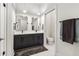 A spacious bathroom with dual sinks, modern fixtures, and a separate toilet area, offering comfort and style at 112 Rogers Ne St # 206, Atlanta, GA 30317