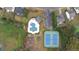 Overhead view of the pool, tennis courts, playground and parking within the community at 4280 Hunters Walk Way, Cumming, GA 30028